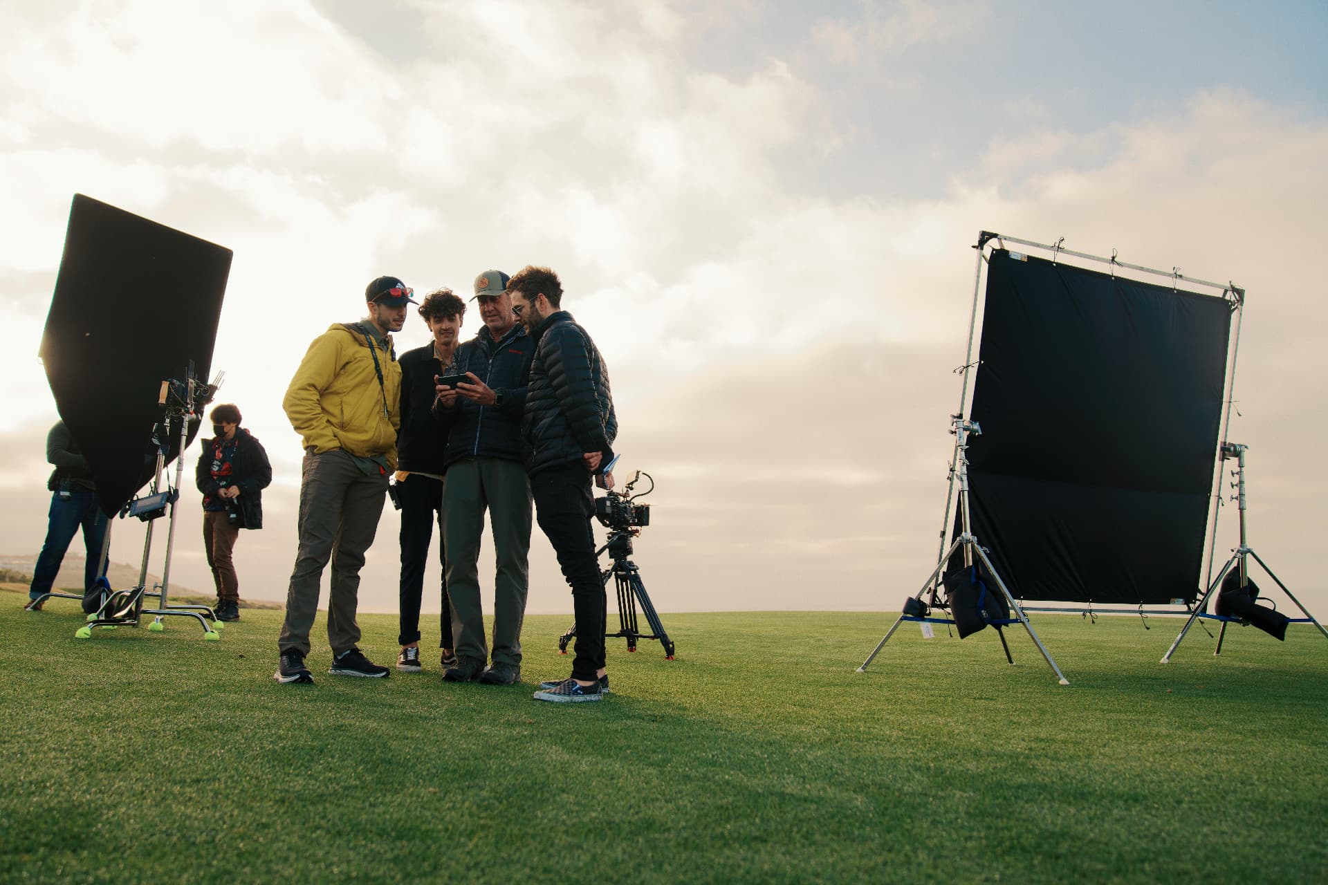 Juanma Sierra and crew reviewing footage between production screens